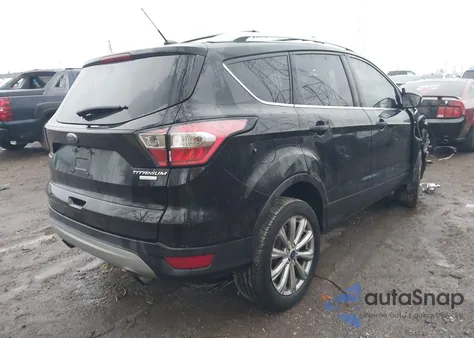 2017 Ford Escape Titanium z USA, uszkodzony, nr VIN 1FMCU0JD4HUE33758
